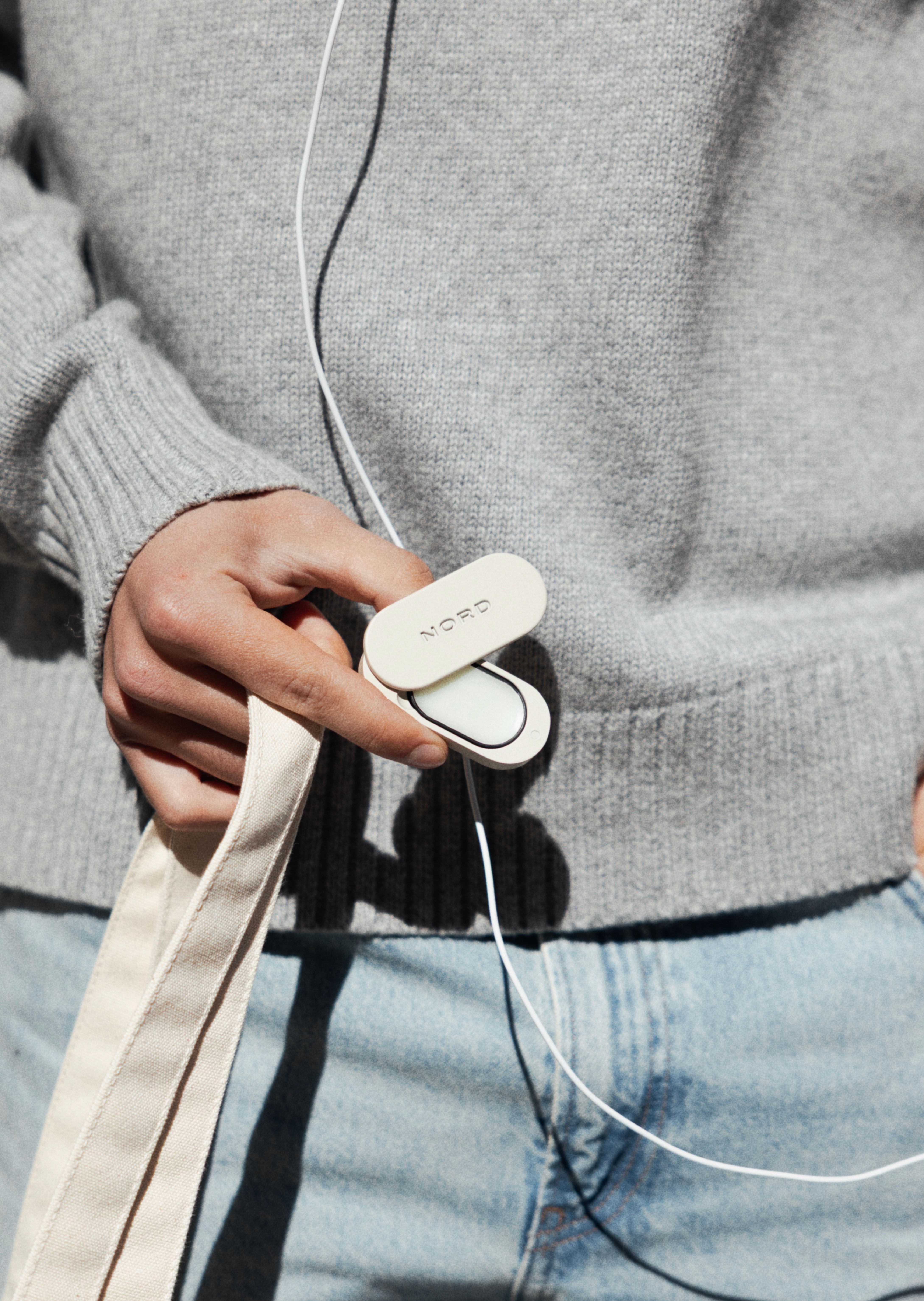 Person holding a Nord Scents Solid Perfume Case